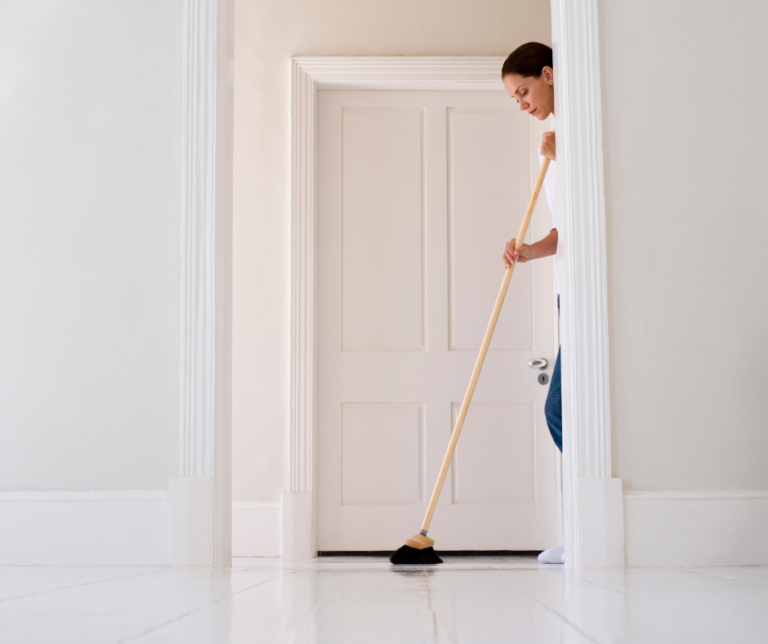 broom cleaning home