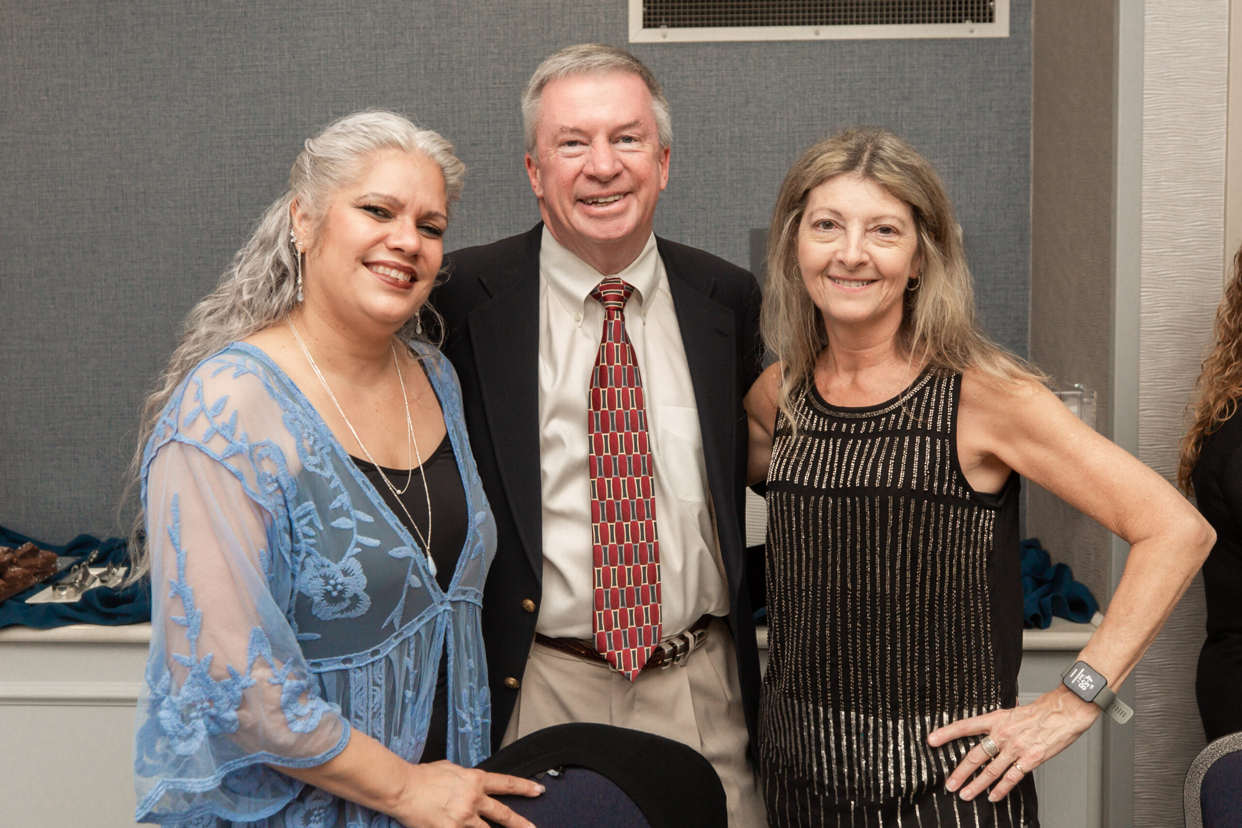 Broker-in-Charge, Jim Parker sharing his appreciation with the South Strand Office ladies, Property Manager and Realtor Lisa Melendez and Accountant Lynne Jessup