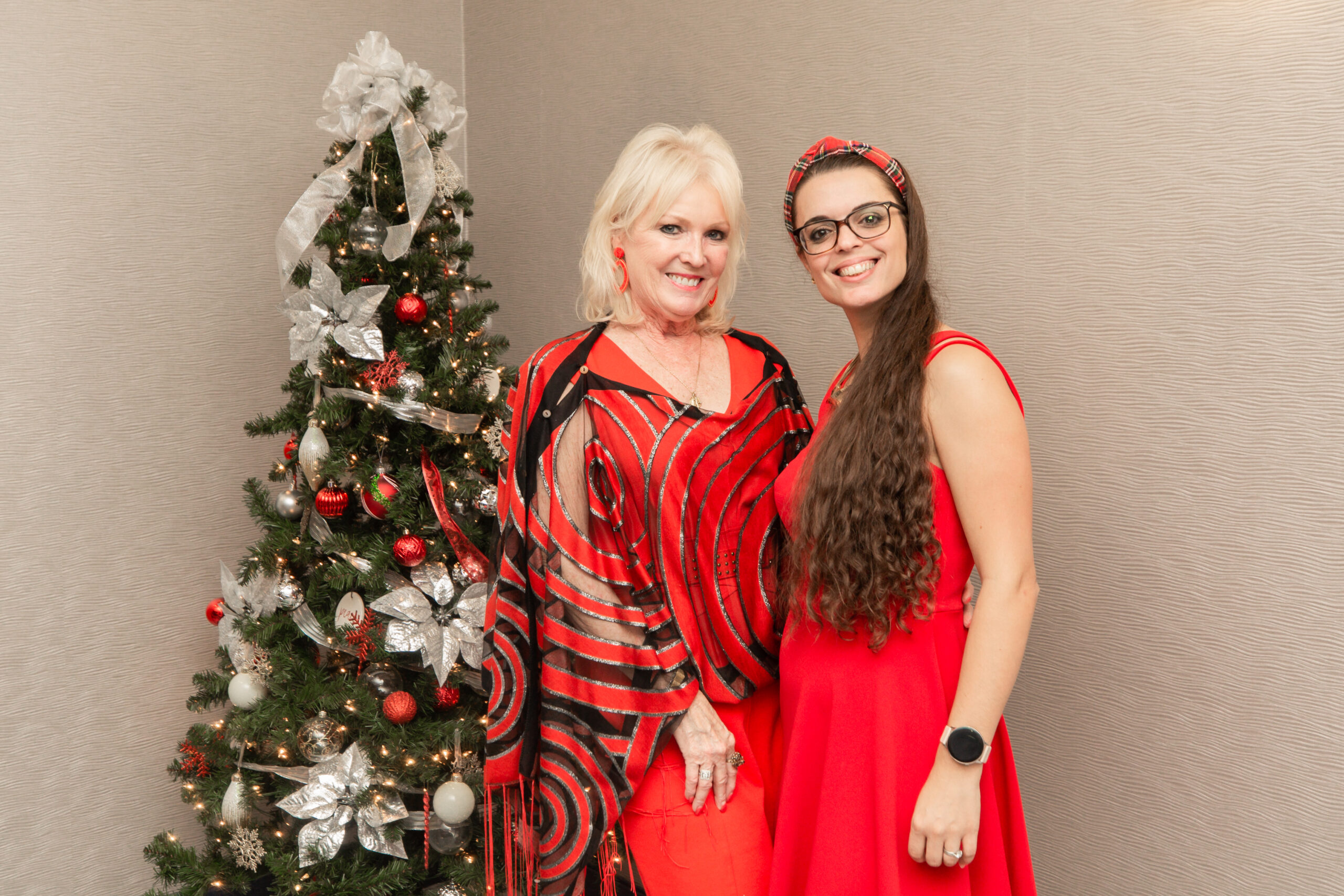 Broker Associate Kate Rushton and Web Designer Solange Edwards looking festive at the party