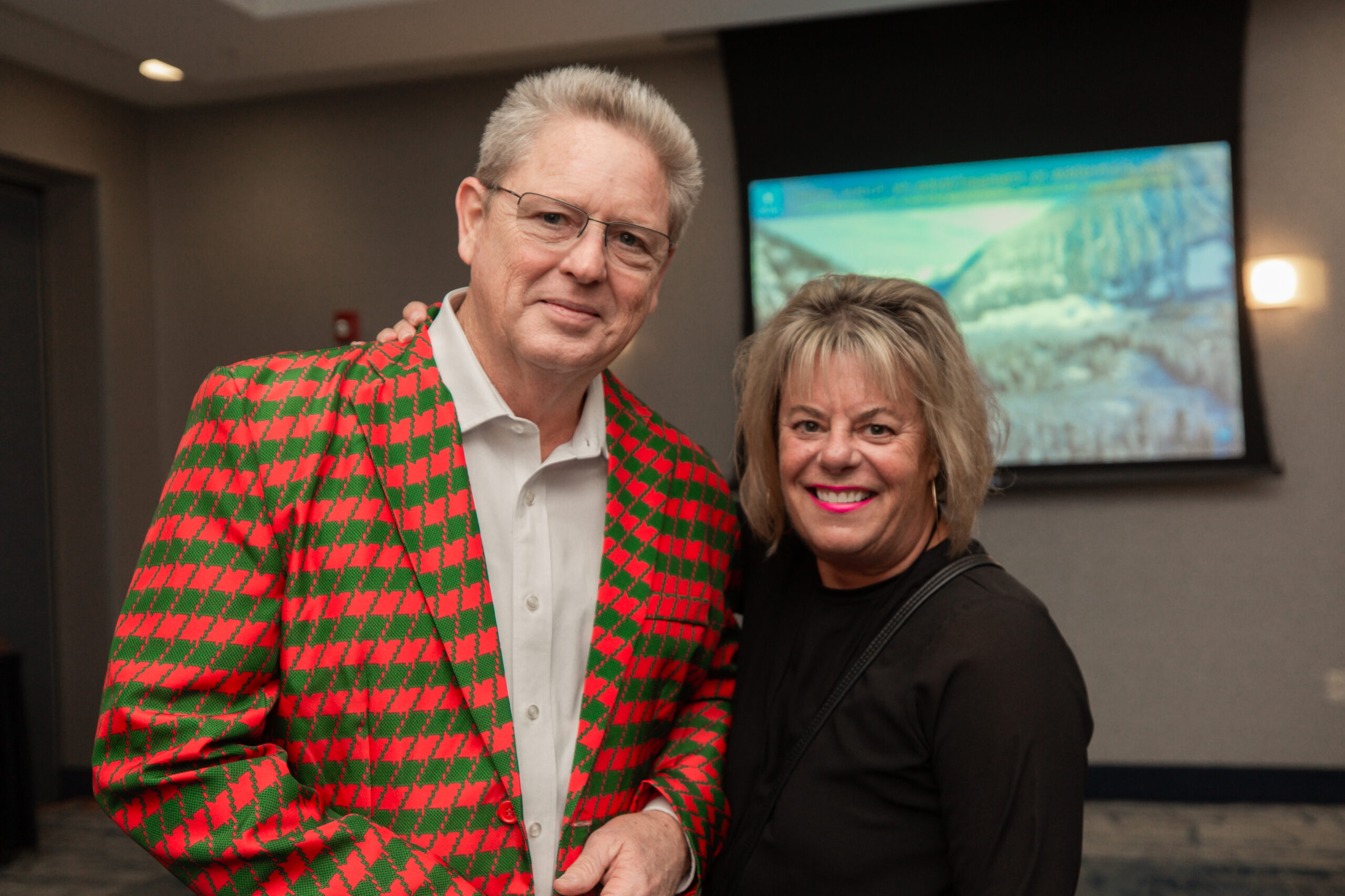 Realtors Jeff Wiltcher and Terri Hayman looking dashing at the office Christmas party
